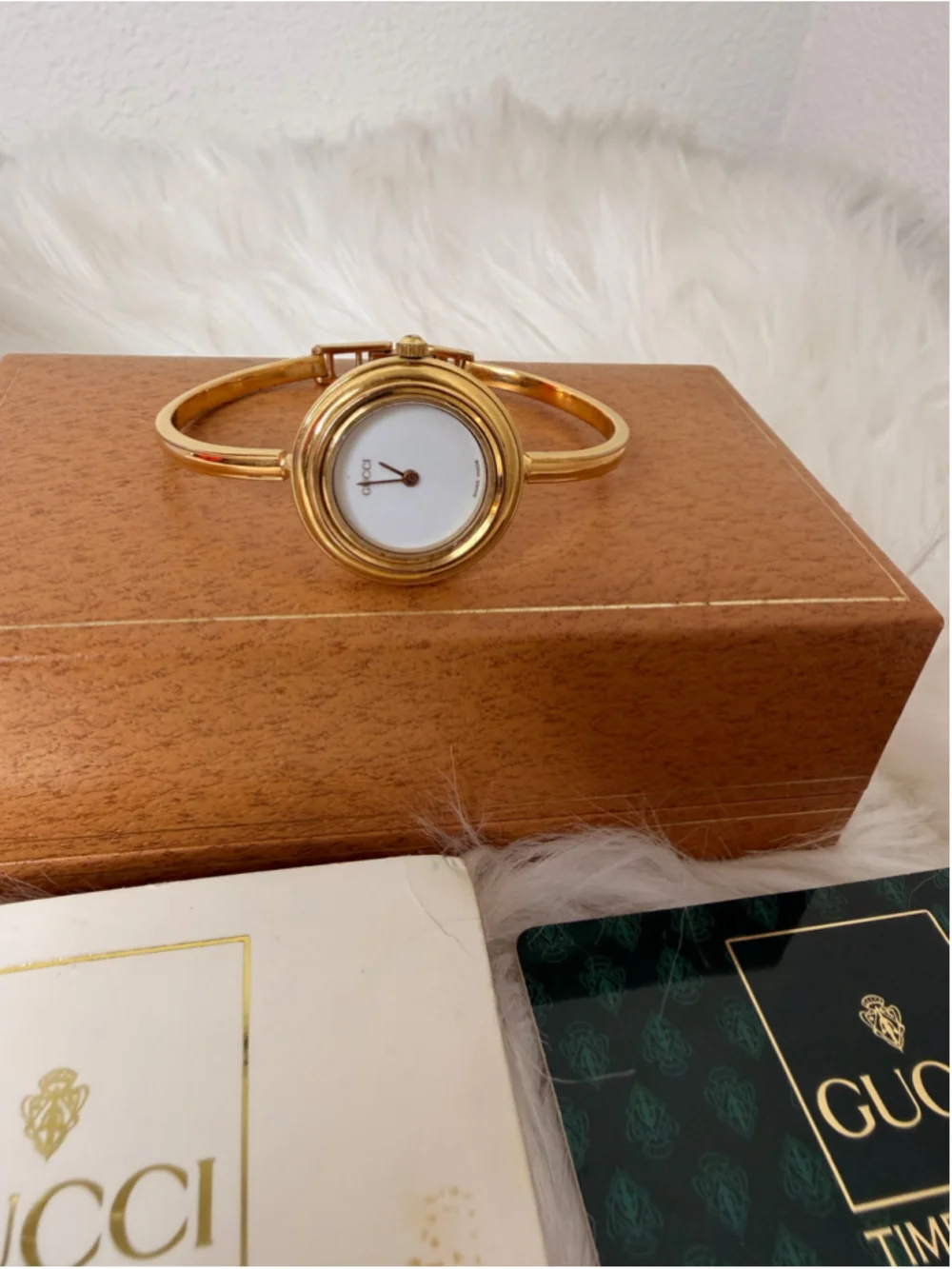 Gucci 11/12.2 Interchangeable Bezel Bangle Watch, w/ 12 bezels, box & paperwork